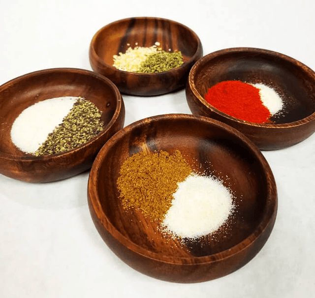 Wooden bowls with spices